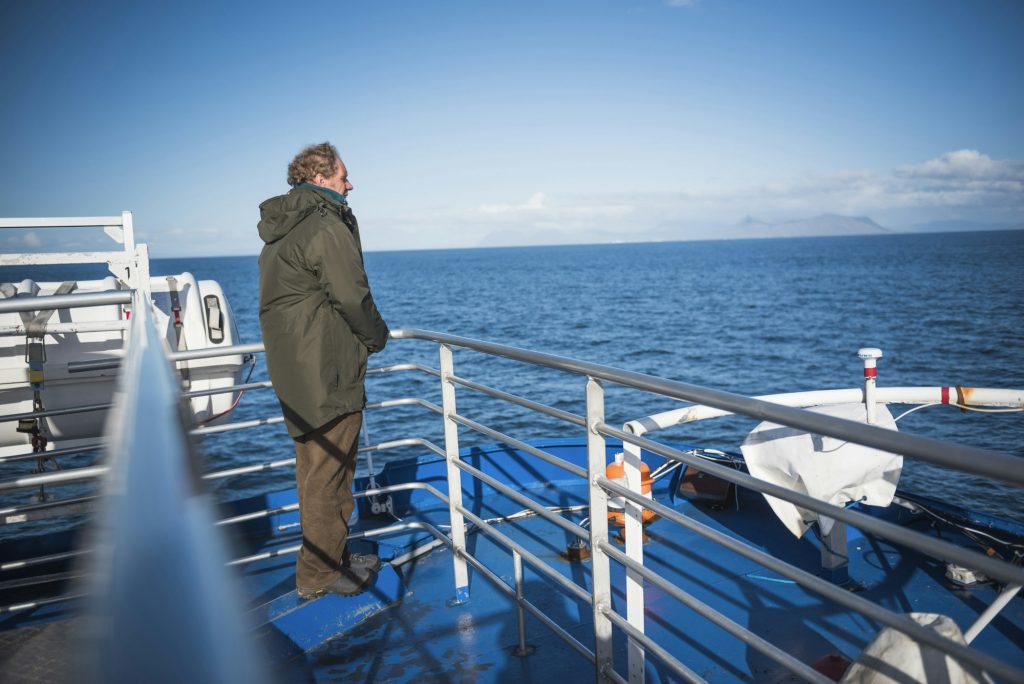 Tourist on a whale watching boat, Reykjavik, Iceland